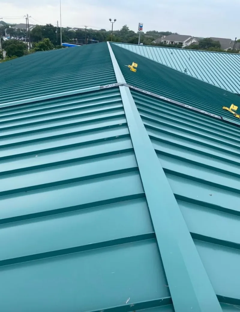 Green commercial metal roof ridge and valley for Metal Roof Repair in Schertz